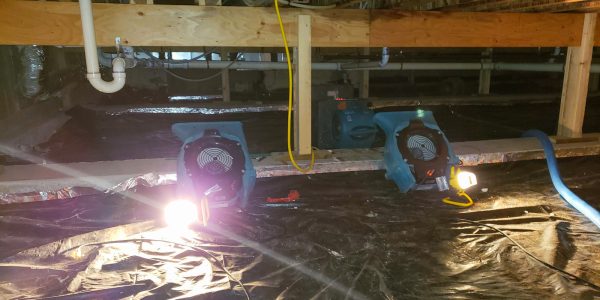 Water damage inside a home crawl space — unchecked crawl space moisture causes wood rot, mold, and poor indoor air quality.